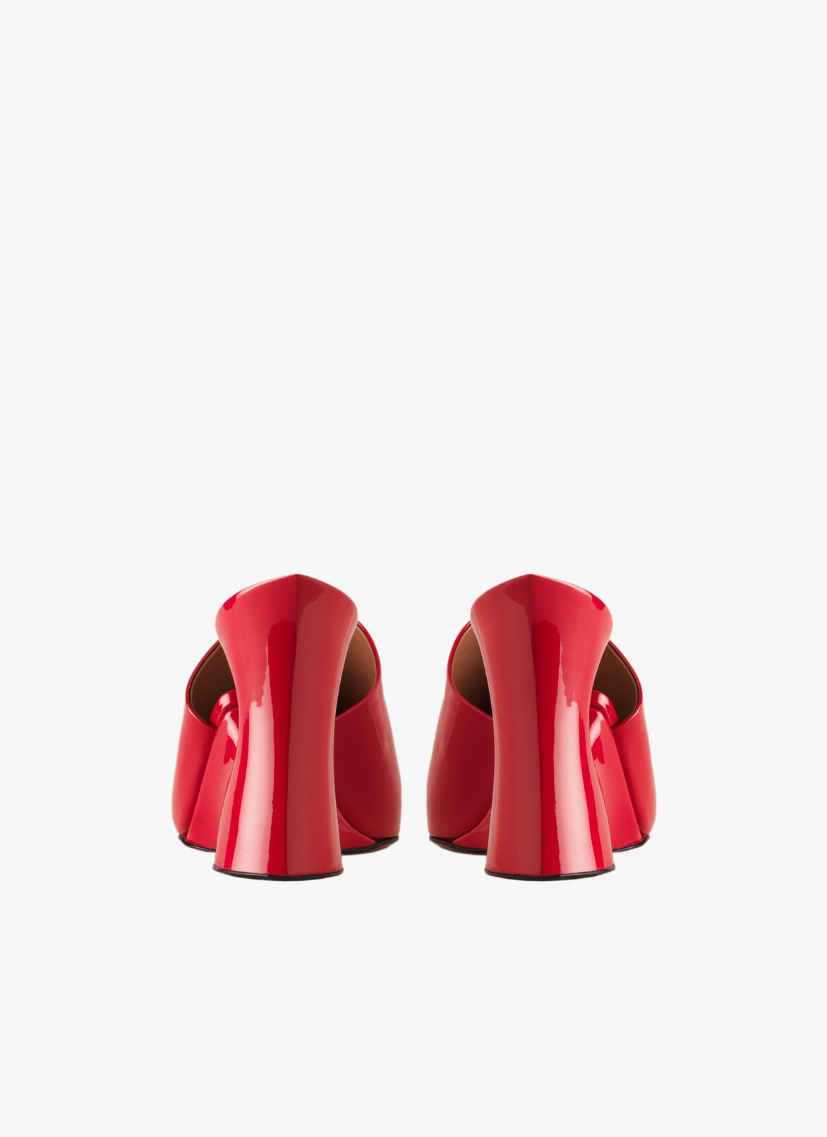 La Sculpture mules in calfskin ALAÏA LACQUER RED LA SCULPTURE MULES IN CALFSKIN
